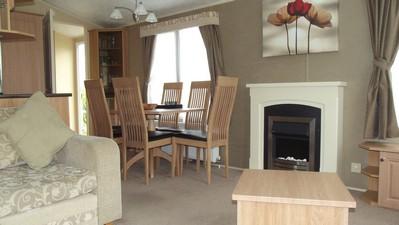 Dining area and fireplace from seating area